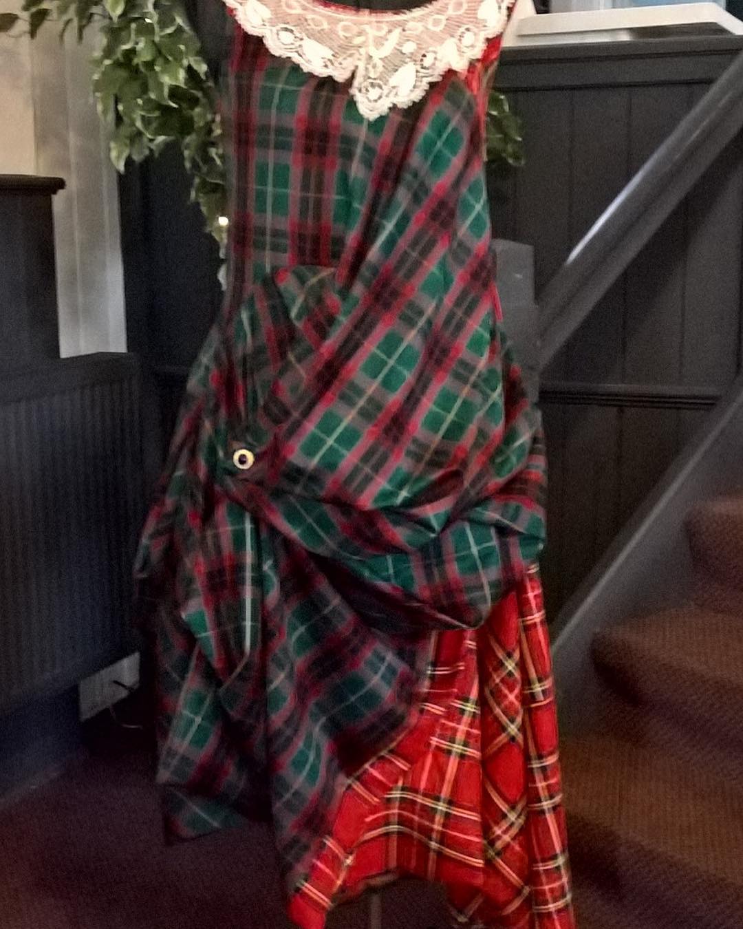 Tartan party frock made from recycled material. The collar is vintage lace.